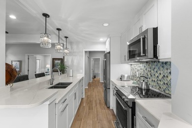 This beautifully updated coastal condo offers the perfect blend - photo 22