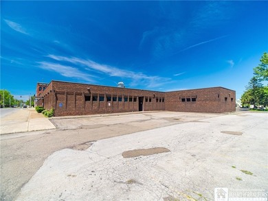 Large well maintained brick building with ample parking situated - photo 3