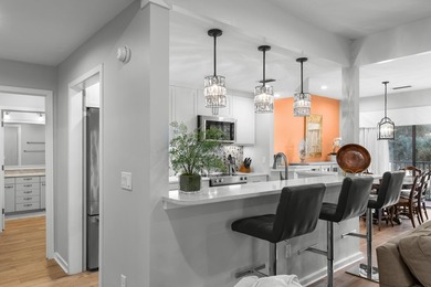 This beautifully updated coastal condo offers the perfect blend - photo 23