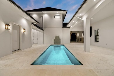 Discover refined coastal living in this stunning custom-designed - photo 4