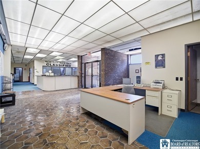 Large well maintained brick building with ample parking situated - photo 6