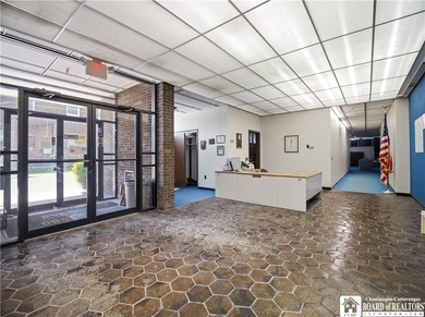 Large well maintained brick building with ample parking situated - photo 7