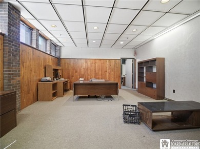 Large well maintained brick building with ample parking situated - photo 8