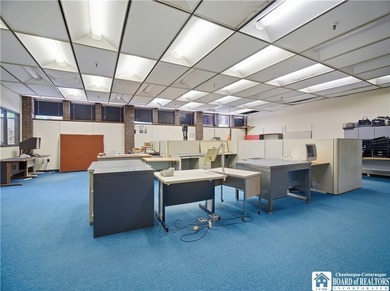 Large well maintained brick building with ample parking situated - photo 9