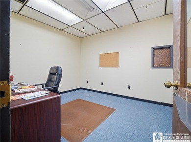 Large well maintained brick building with ample parking situated - photo 10