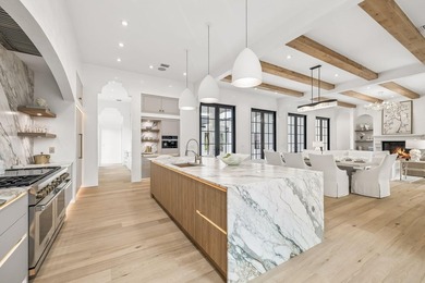 Discover refined coastal living in this stunning custom-designed - photo 10