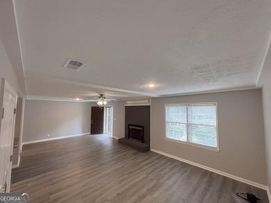 Welcome home to this spacious, move-in ready 4-bedroom, 2.5-bath - photo 3