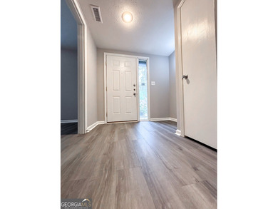 Welcome home to this spacious, move-in ready 4-bedroom, 2.5-bath - photo 8