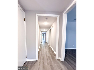 Welcome home to this spacious, move-in ready 4-bedroom, 2.5-bath - photo 9