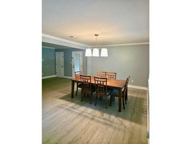 This lovely home offers 3 bedrooms and 2 baths, with a welcoming - photo 2