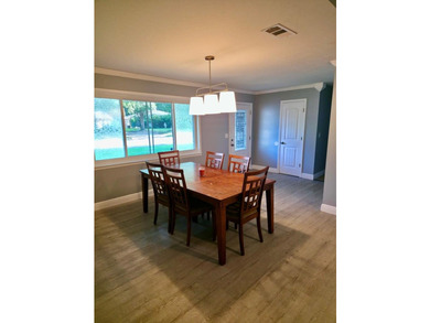 This lovely home offers 3 bedrooms and 2 baths, with a welcoming - photo 3