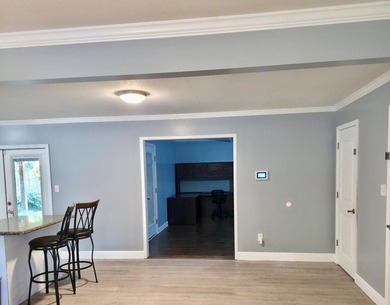 This lovely home offers 3 bedrooms and 2 baths, with a welcoming - photo 5