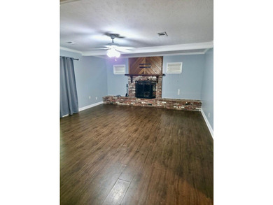 This lovely home offers 3 bedrooms and 2 baths, with a welcoming - photo 7