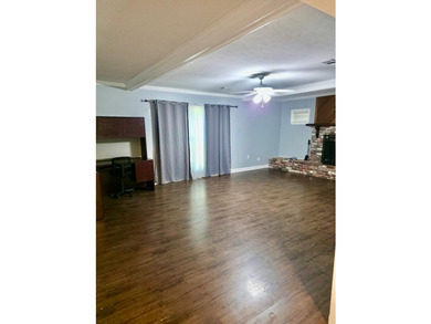 This lovely home offers 3 bedrooms and 2 baths, with a welcoming - photo 8