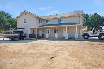 3 bedroom 2 1/2 bath on a flat corner lot. This open layout is - Lake Home Sale Pending in Bradley, California