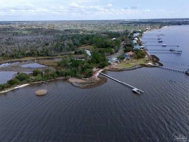 Waterfront lot on Escambia Bay offering direct access to the - photo 12