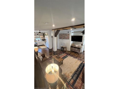 Whether you desire an absolutely charming lake house for - photo 3