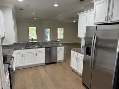 Welcome to this stunning 3-bedroom, 2-bath home with a dedicated - photo 5