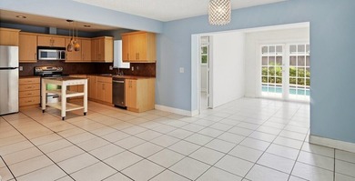 A NEW ROOF welcomes you into this charming pool home in - photo 17
