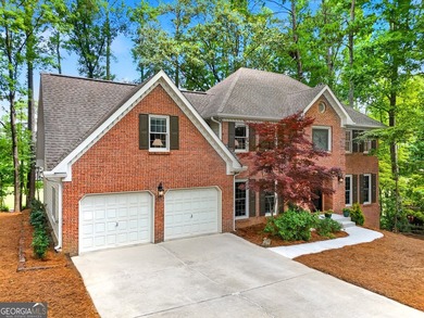 WELCOME HOME to this 4 bed, 3.5 bath golf-side brick-front - photo 2