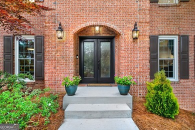WELCOME HOME to this 4 bed, 3.5 bath golf-side brick-front - photo 6