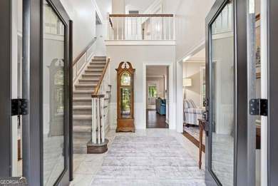 WELCOME HOME to this 4 bed, 3.5 bath golf-side brick-front - photo 7