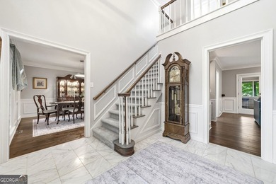 WELCOME HOME to this 4 bed, 3.5 bath golf-side brick-front - photo 9