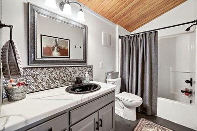 Perfectly perched and nestled upon the serene, exclusive shores - photo 34