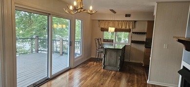 Welcoming covered front porch w/ composite decking & lake views - photo 36