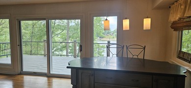 Welcoming covered front porch w/ composite decking & lake views - photo 39