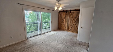 Welcoming covered front porch w/ composite decking & lake views - photo 49