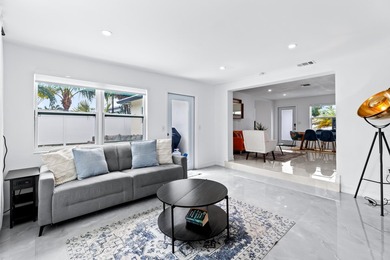 Welcome to this ultra-modern 3-bedroom, 2-bathroom single-story - photo 12