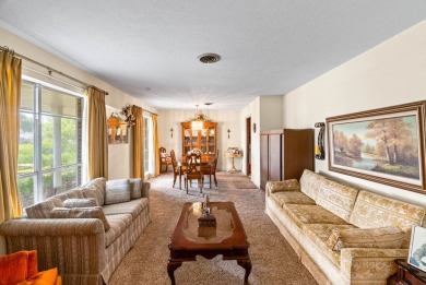 This home features a double lot and an oversized garage so you