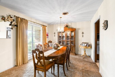 This home features a double lot and an oversized garage so you