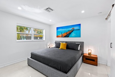 Welcome to this ultra-modern 3-bedroom, 2-bathroom single-story - photo 15