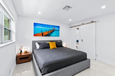 Welcome to this ultra-modern 3-bedroom, 2-bathroom single-story - photo 16