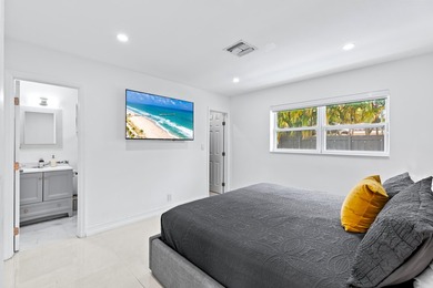 Welcome to this ultra-modern 3-bedroom, 2-bathroom single-story - photo 17
