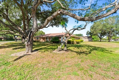 This home features a double lot and an oversized garage so you