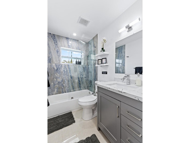 Welcome to this ultra-modern 3-bedroom, 2-bathroom single-story - photo 23