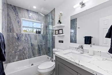 Welcome to this ultra-modern 3-bedroom, 2-bathroom single-story - photo 24