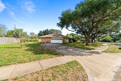 This home features a double lot and an oversized garage so you