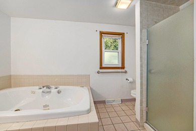 Just under 1 Acre is the setting for this almost 3,000 square