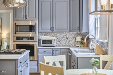 Light-filled and spacious, this Treyburn home offers a flexible - photo 38