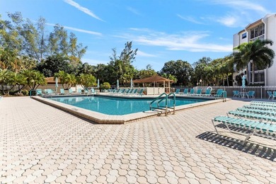 This spacious 3-bedroom, 2.5-bath corner unit in the gated *18th - photo 49