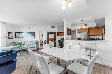 Located on a high floor of Metropolis II, Unit 908 offers a