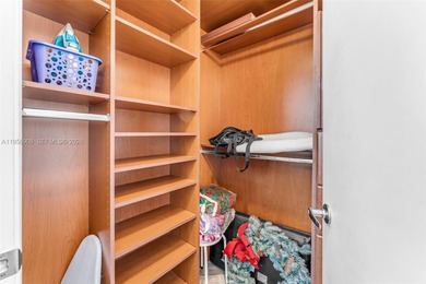 Located on a high floor of Metropolis II, Unit 908 offers a