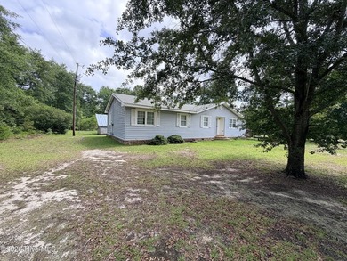 Investment Opportunity with Great Potential! This home has good - photo 2