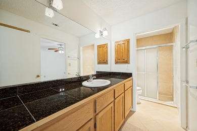 Nestled on a picturesque golf course lot in Richardson, this - photo 17
