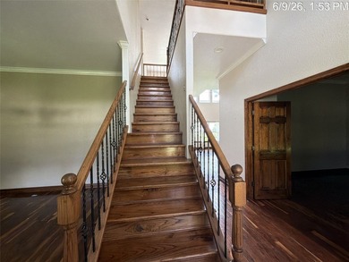 Set on 1.48 wooded acres along Lake Limestone, this custom stone - photo 19