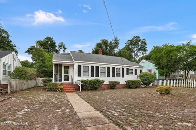 Charming 3-bedroom, 1.5-bath home nestled in the established - photo 2